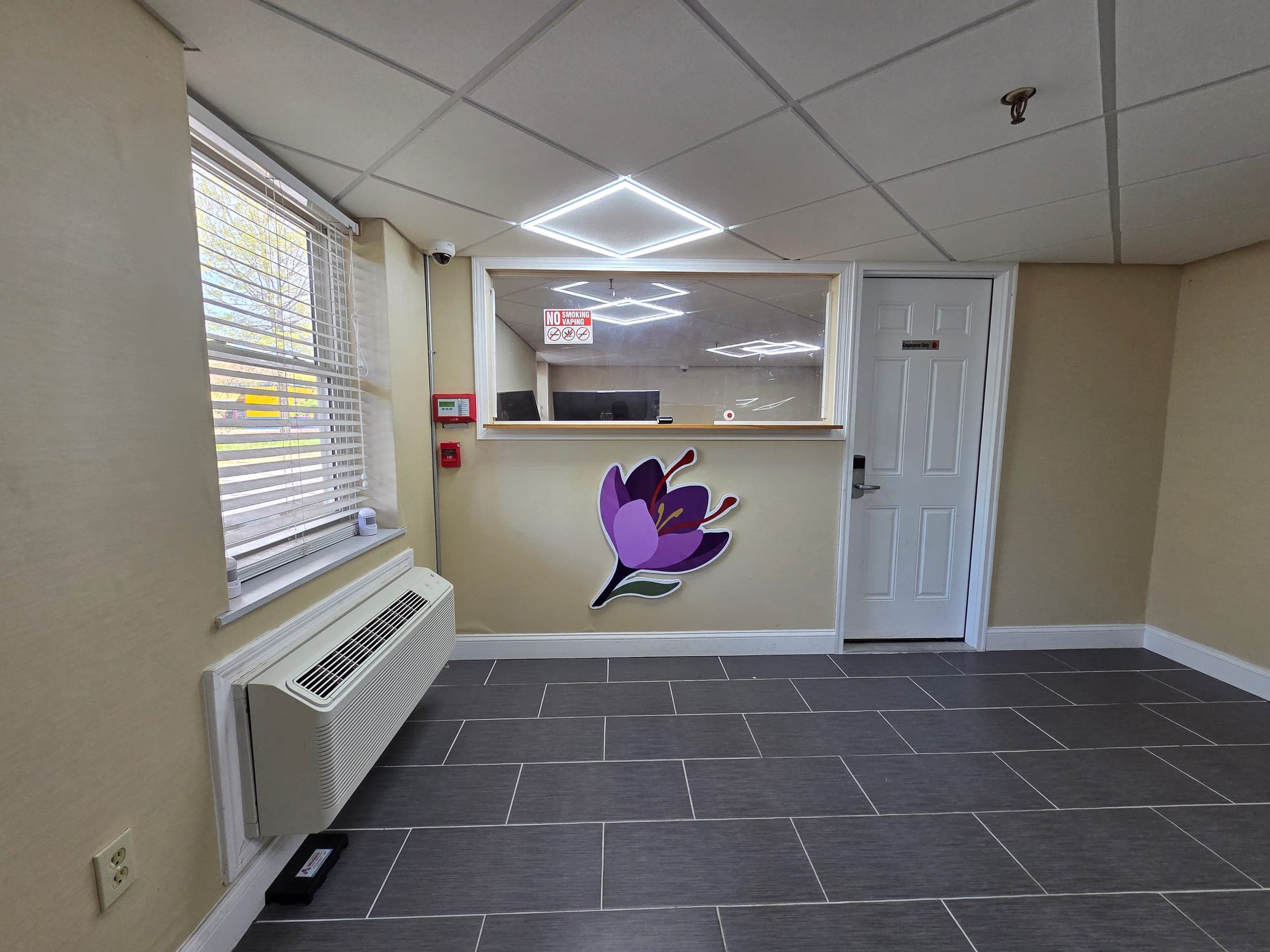 Saffron Inn front desk — staffed 24 hours a day at 170 Center Street, Auburn Maine